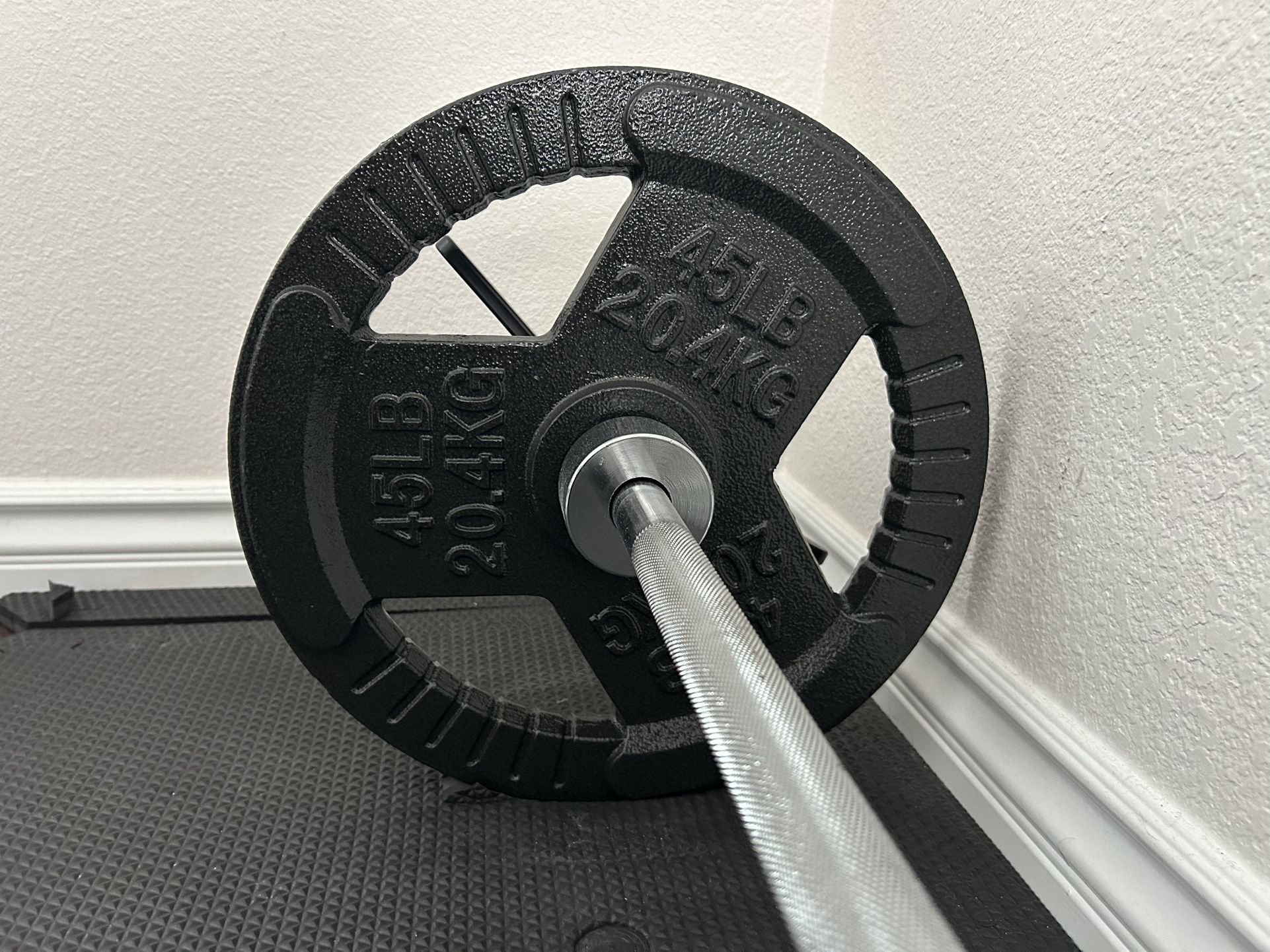 Olympic Barbell And Weight Plates