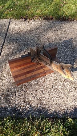 Miter box with saw