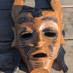 13.5" Hand-Carved African Tribal Wooden Mask Wall Decor with Horned Design