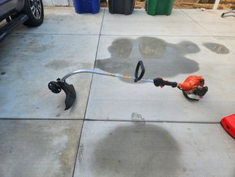 ECHO 21.2 cc Gas 2-Stroke Curved Shaft String Trimmer with Rapid-Loader Trimmer Head Questions & Answers