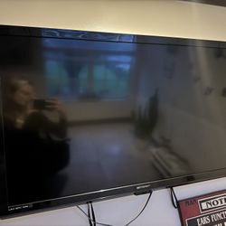 2 Fifty Inch TVS with Wall Mounts 