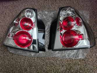 2004-2007 Chevy Malibu Chrome Euro Altezza Tail Lights Pair (Left + Right)