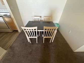 Dark Top Dining Table with 4 Chairs