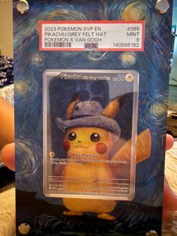 Pikachu with a grey felt hat psa 9!!!!! Comes with case!