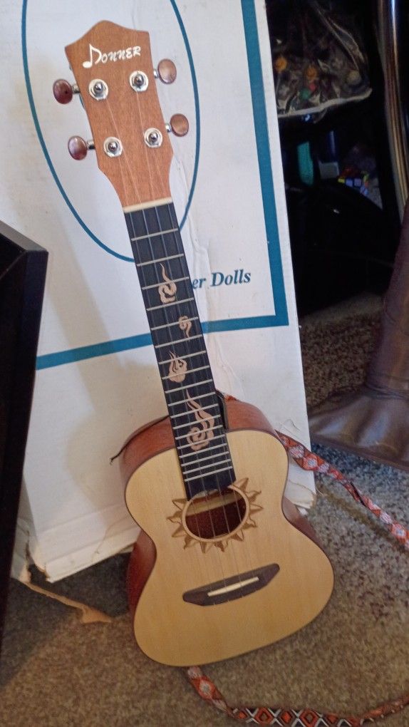 I Have This Very Nice Ukulele Donor Made By Comes With Cleaner Pics And Guitar Tuner
