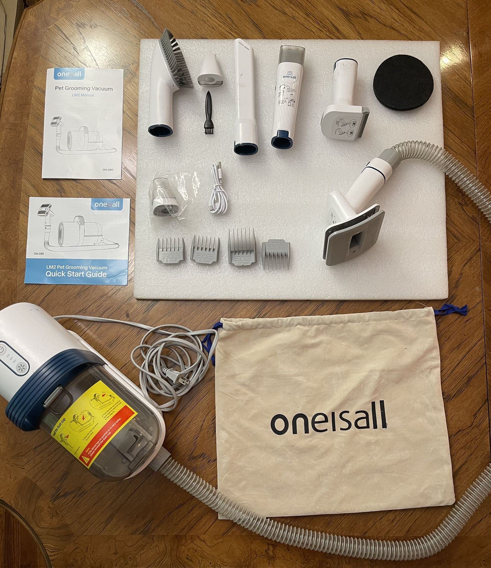 Oneisall Dog or Pet Grooming Vacuum Kit with a Plethora of Attachments