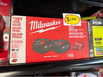Milwakee m18 2 battery and 1 charger combo