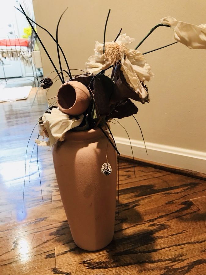 Light pink ceramic vase with silk flowers