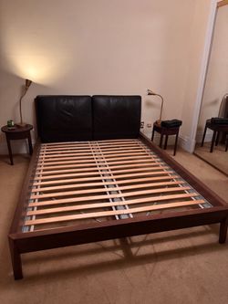 Queen Size Bed - walnut hardwood and a faux leather headboard