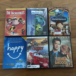 DVDs Pixar Cars, Monster Inc., Ratotouille, The Incredibles, Turner & Hooch, Happy
