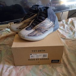 Adidas Yeezy QNTM sneakers in the Amber Tint colorway, model GX1331.