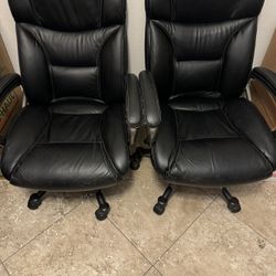 Two Black Leather Rolling Chairs