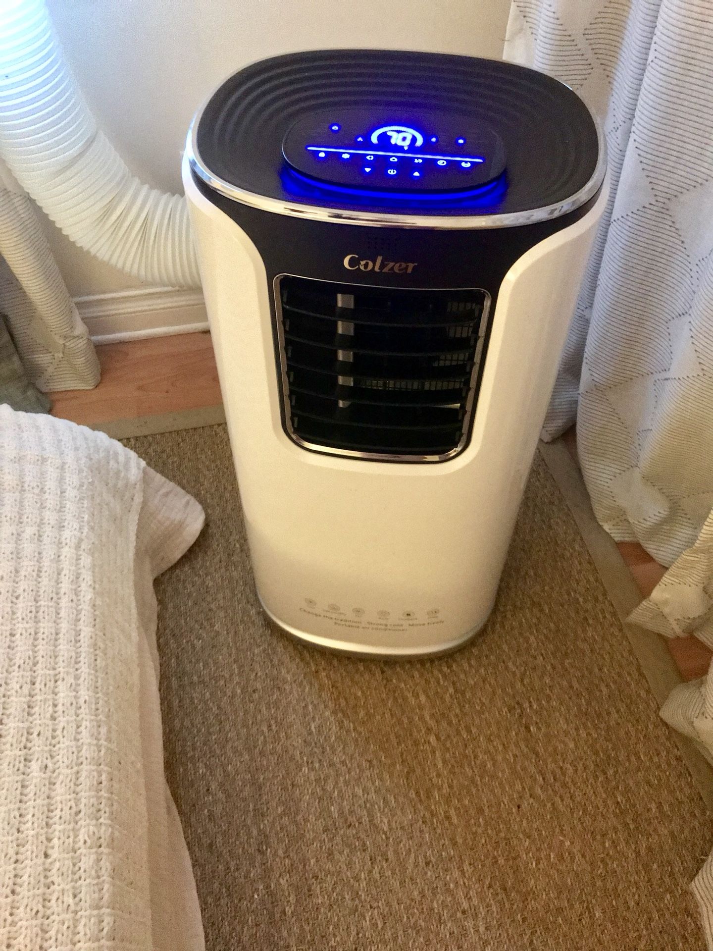 Colzer 14,000 BTU portable AC, heater, fan. Paid $425 two months ago. Works great. Barely used.