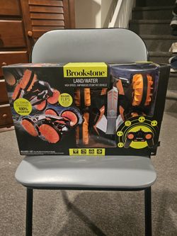 REMOTE CONTROL CAR, RECHARGEABLE, LAND/WATER, BRAND NEW,