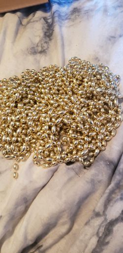 Gold beads to decorate christmas tree - holiday decorations