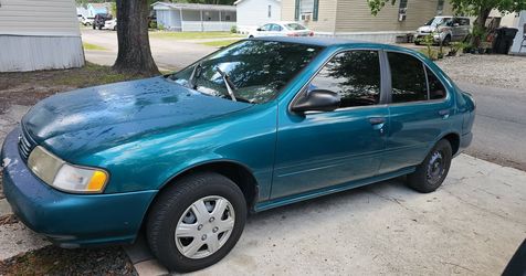 Nissan sentra 1997 1.6    $ 1200