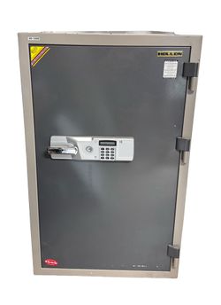 For sale is a medium size auto-locking safe