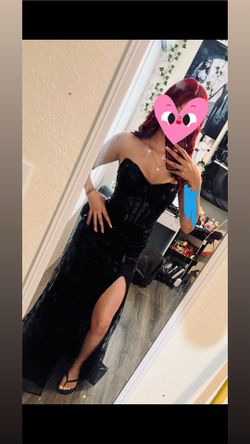 Black dress size Xm fits  a 2-3