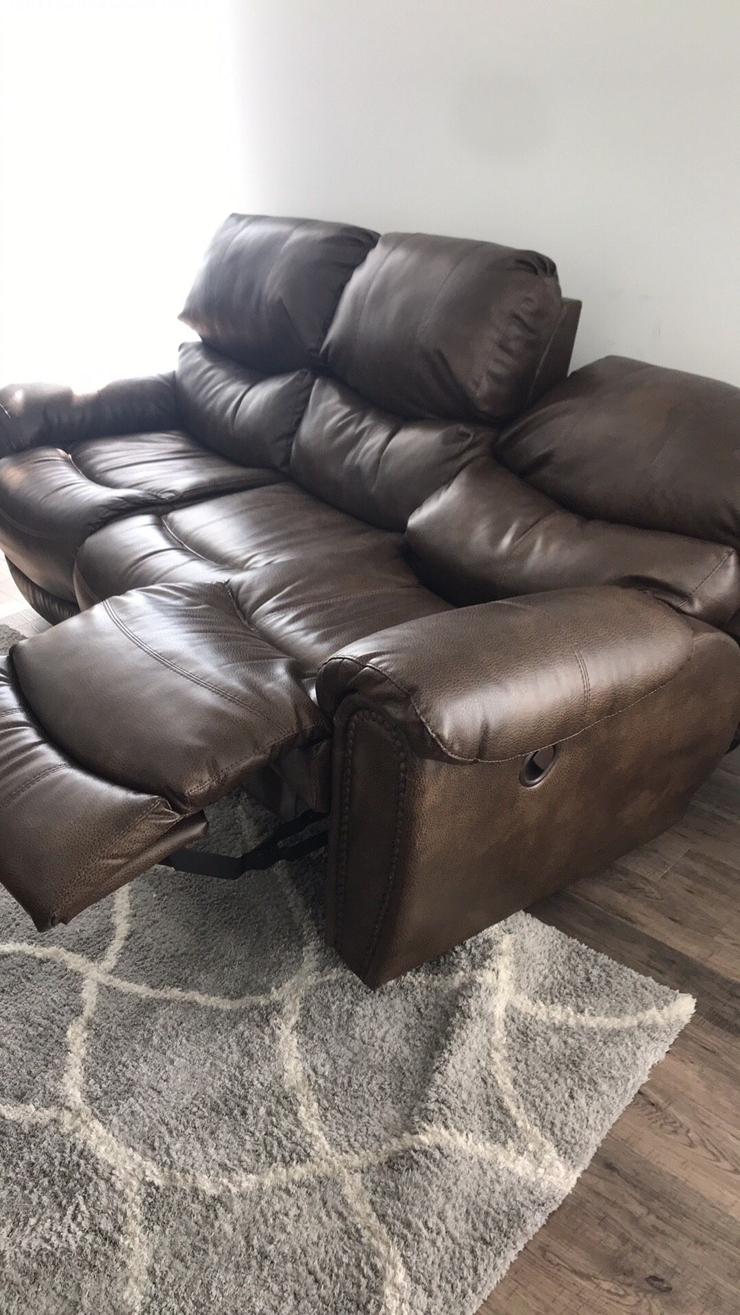 LEATHER RECLINER COUCH AND LOVE SEAT