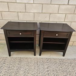 Pair of black wooden nightstands. Price is firm
