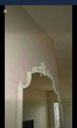 Off white ornate mirror. Needs tix 4 x 3.5 ft
