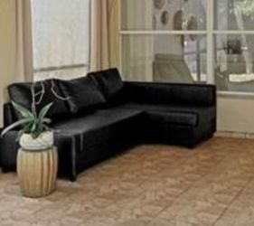 Faux leather couch with storage and ottoman