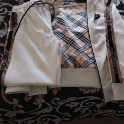 Brand new burberry  jumpsuit. 2 pieces. Size medium Large