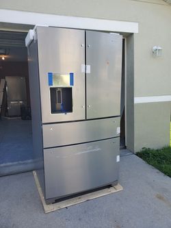 Brand new whirlpool 4 door fridge