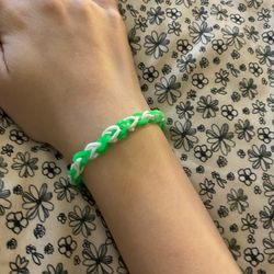 Green and white colored bracelet