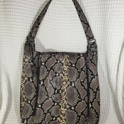 
Joe’s Jeans faux snakeskin hobo tote bag. Large and roomy! Great condition! Beautiful bag! 