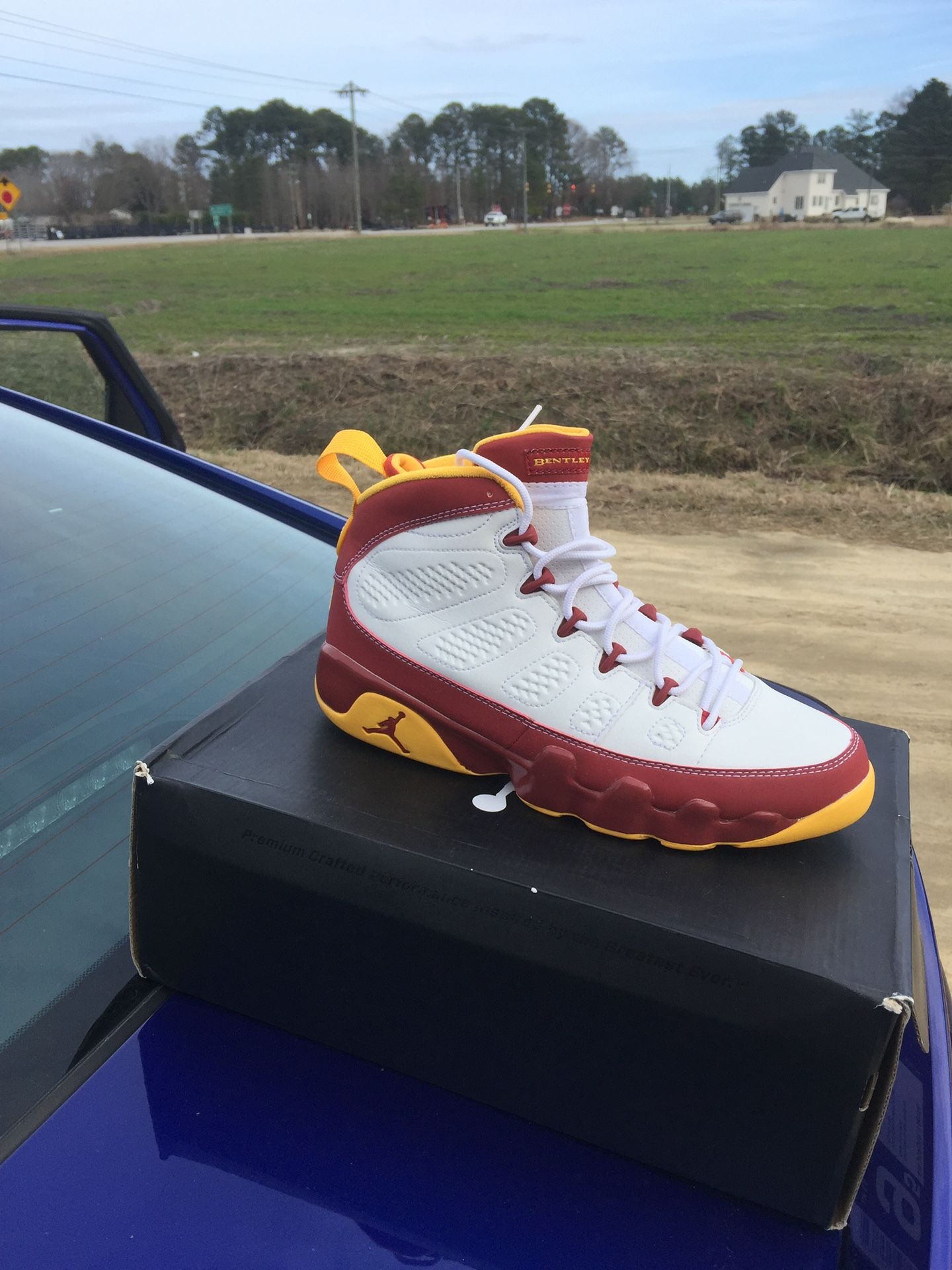 Jordan 9 White/ Red/Yellow