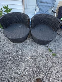 St of 2 black patio chairs