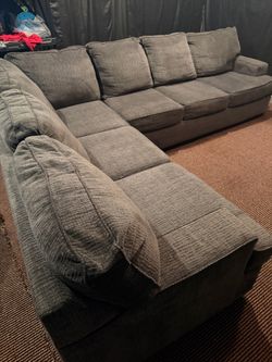 Sectional living room with ottoman