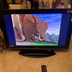 32"sharp tv and dvd combo with remote control - $30