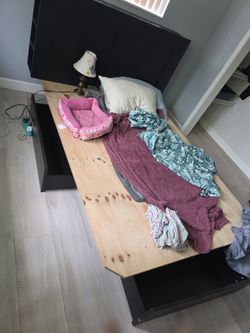 FREE QUEEN BED WITH HEADBOARD WITH SHELVES, BELOW HAS 2 LG DRAWERS