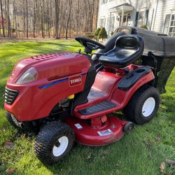 Toro Lawn Tractor with A Dumping Cart 