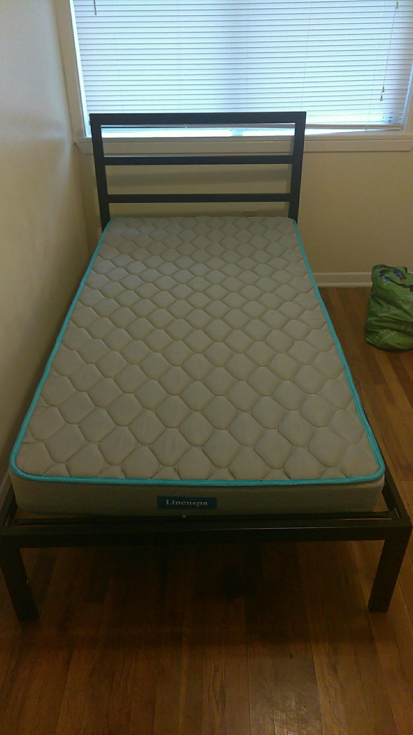 Twin metal bed w/ mattress included