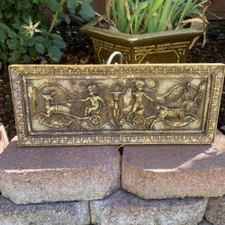 A panel Frame featuring cherubs in chariots