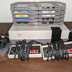 Nintendo NES Lot with 10 Games, 2 Contollers