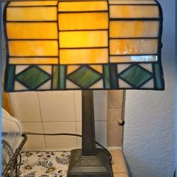 Tiffany-style bankers lamps and similar vintage-inspired desk lights.
