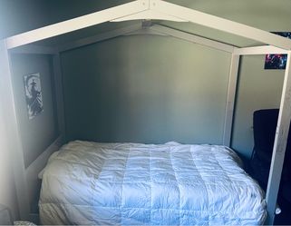 light grey platform bed (no mattress)
