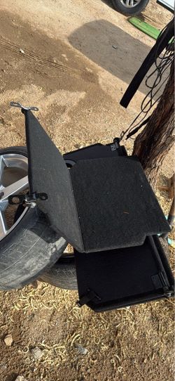 storage lids for underseat storage ram