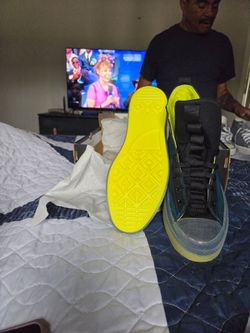 2 pair of converses light blue,and Grey with yellow,size 8 for $75. For both