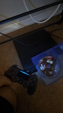 PlayStation 4 Console with Controller and Game
