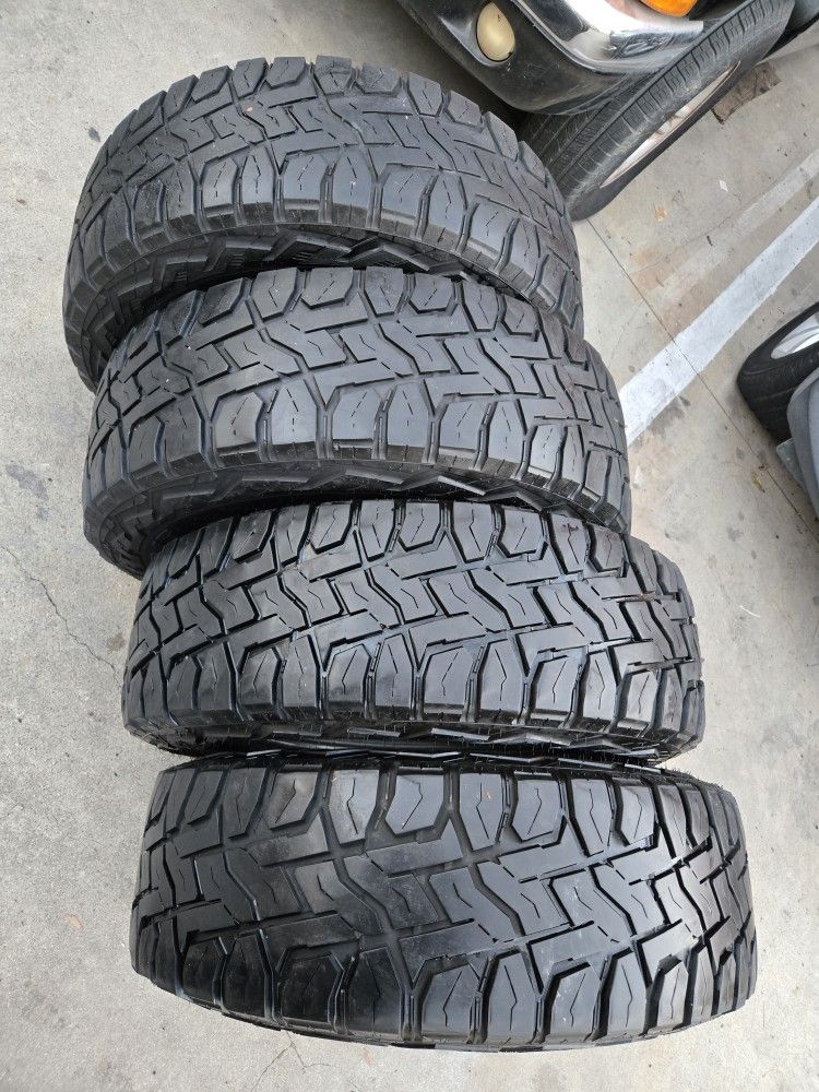 4.  PCS OF TIRES.    TOYO R T OPEN COUNTRY.  SIZE LT 265/70/17