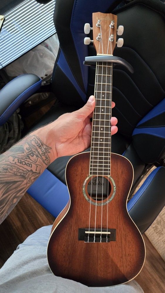 Ukulele W/ Capo