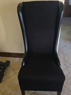 Pair of black dining chairs