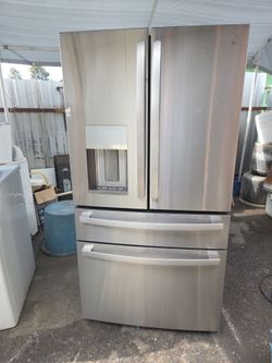 Ge Profile French Doors with access door 4 door warranty Financing with snap if you qualify Cosmetic Issues from scratch and dent