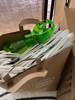 Bag of free clothes hangers and other random items