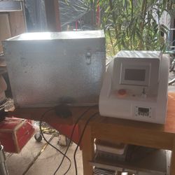 A Switch ND VAG Laser Machine For Tattoo Removal, But Older Gun
